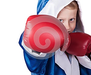 Close up little boy portrait in boxing gloves