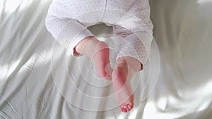 Close-up of the little feet of a newborn baby