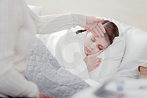 Close up of little girl sleeping in bed