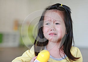 Close up Little kid girl crying with tearful on her face