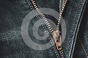 Close up of locking zipper on blue denim jeans