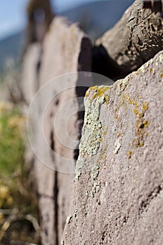 The close up long view of the red rock fence line