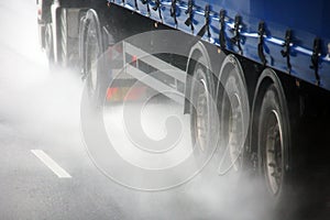 Close up lorry wheels on a highway
