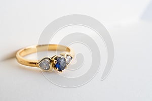 Close up love sapphire ring in book