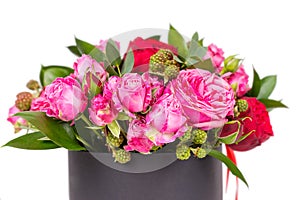 Close up of lovely bouquet of pink and red roses isolated on white background