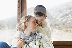 Close up of a loving young couple in winter clothing photo