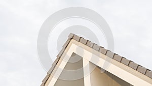 close-up, low angle shot, top corner of a gable roof, of a modern house, beautiful, luxurious