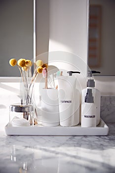 Close Up Of Luxury Toiletries On Tray In Beautiful Bathroom