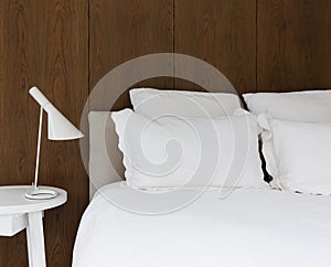 Close up of luxury white linen with walnut lining boards on the