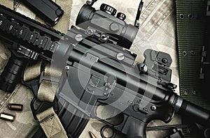 Close-up of a M4A1 weapons and military equipment for army, Assault rifle gun and pistol photo