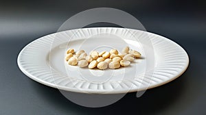 Closeup of macadamia nuts on a white plate