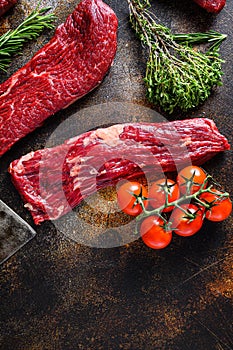 Close up machete Steak, Flank steak, cut near denver alternative beef steak a rustic metall background top view layflat