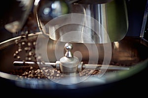 close up of a machine for mixing coffee grains