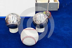 Close up machining metal or stainless steel parts two ball baseball make by automatic high technology accuracy and precision