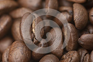 Close up macro a group roasted brown or black coffee grains background