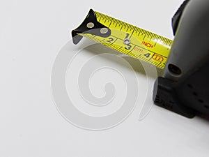 Close up macro image of workmans measuring tape for checking distances