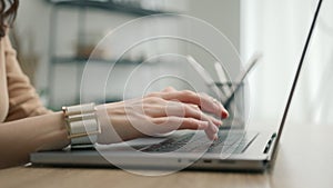 Close up macro shot of Businesswoman person typing on modern computer keyboard