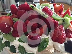 Close up macro shot of fruit salad strawberries and kiwi fruit