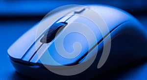 Close Up Macro Shot of a Wireless Computer Mouse in Blue Light technology device