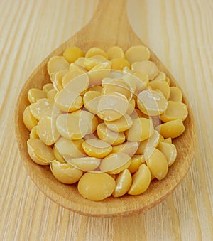 Close up,macro soy beans in  wooden spoon