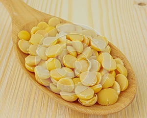 Close up,macro soybeans in  wooden spoon