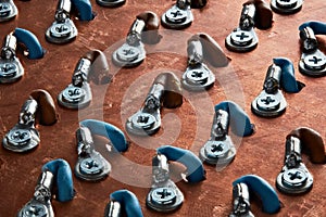 Close up macro view of copper busbar panel for high current power distribution.