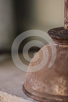 Old vintage rusty metal oil can