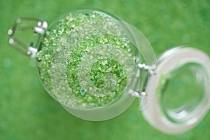 Close up magnesium fertilizer in glass bottles .blur background