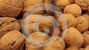 Close-up with a magnifying glass. Rotation of walnuts.