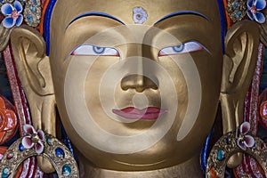 Close up of maitreya buddha in thiksey monastery