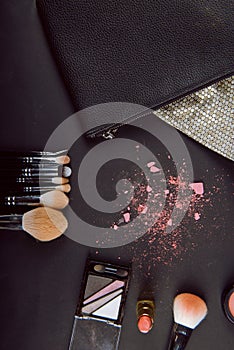 close up of a make up powder and a brush