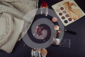 close up of a make up powder and a brush