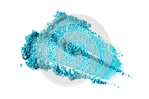 Close-up of make-up swatches. Smears of crushed shiny blue eye shadow