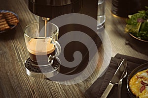 Close-up of making coffee in a capsule coffee machine
