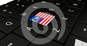 Close up of Malaysia button.