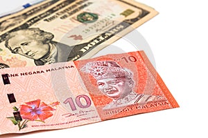 Close up of Malaysia Ringgit currency note against US Dollar