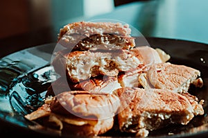 Close up of Malaysian well known food `Roti John` on a dark background.