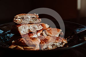 Close up of Malaysian well known food `Roti John` on a dark background.