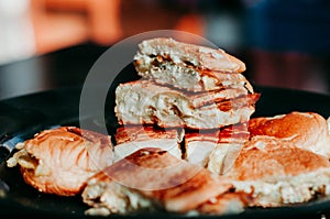 Close up of Malaysian well known food `Roti John` on a dark background.