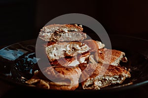 Close up of Malaysian well known food `Roti John` on a dark background.