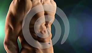 Close up of male bodybuilder bare torso