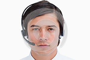 Close up of male call center agent with headset on