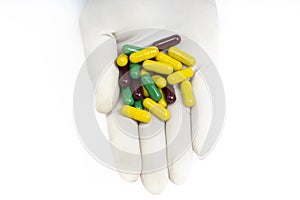 Close-up Of The Male Doctor Offering Pills capsules