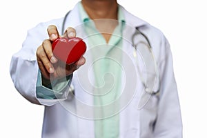 Close up male doctor with red heart isolated on white background