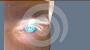 Close up of male eye with iris scan on a grey background. Future technology, identity recognition and vision concept.