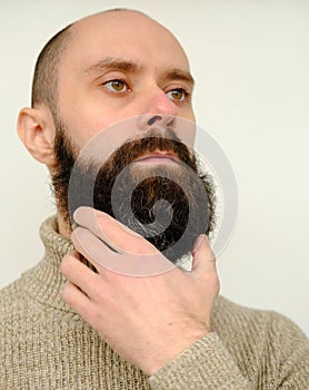 Close-up of male  face, young bearded man