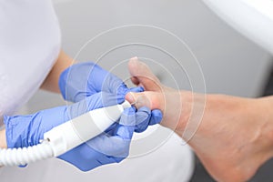 Close up of male foot on pedicure treatment