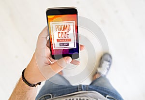 male hand gift promo code smart phone