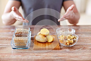 Close up of male hands with carbohydrate food