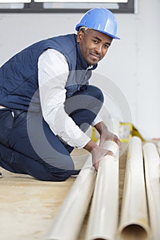 close up male hands rolling carpet